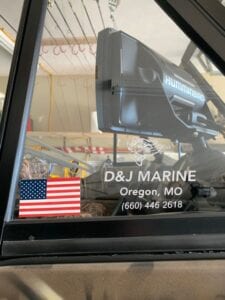 windshield of a boat with US flag sticker