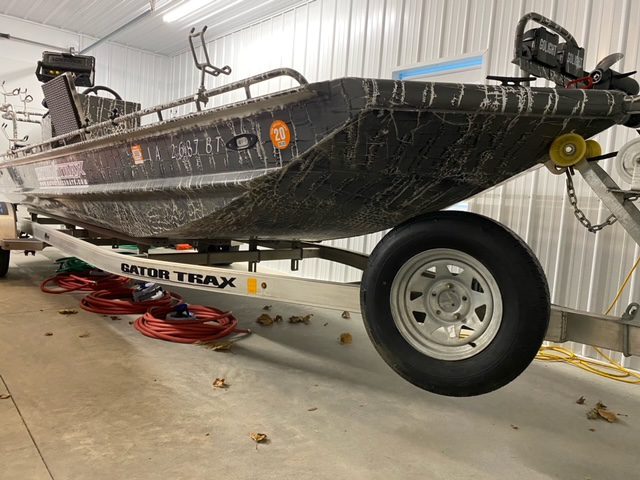 boat on a trailer inside a building